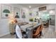 Open-concept dining area with modern decor, seamlessly connecting to the kitchen at 1153 Haven Brook Ln, Brookhaven, GA 30319