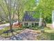 Inviting home featuring lush landscaping, a well-maintained lawn, and convenient parking at 1153 Haven Brook Ln, Brookhaven, GA 30319