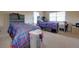 Bedroom featuring two twin beds with desk and storage at 257 Ironwood Dr, Stockbridge, GA 30281