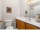 A simple bathroom featuring vanity and shower with tile surround at 375 Highland Ne Ave # 508, Atlanta, GA 30312