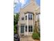 Charming home exterior featuring a stylish front door, bay windows, and manicured landscaping at 375 Highland Ne Ave # 508, Atlanta, GA 30312