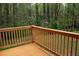 Exterior wooden deck overlooks private backyard at 4907 Windsor Downs Dr, Decatur, GA 30035