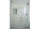Luxurious bathroom with a glass shower, marble accents, and modern fixtures at 4907 Windsor Downs Dr, Decatur, GA 30035
