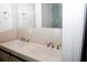 Modern bathroom featuring double sinks, sleek hardware, and minimalist design at 4907 Windsor Downs Dr, Decatur, GA 30035