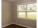 Bright bedroom with a large window, offering ample natural light and street views at 4907 Windsor Downs Dr, Decatur, GA 30035