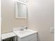 Cozy bathroom with a single sink, vanity, and a mirror at 630 Cambridge Dr, Marietta, GA 30066
