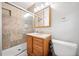 Bathroom with a shower and tile walls at 630 Cambridge Dr, Marietta, GA 30066