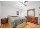 Bedroom with wooden floors and a dresser with a mirror at 630 Cambridge Dr, Marietta, GA 30066