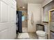Bathroom featuring neutral colors, shower and tile flooring at 2172 Oakland Ridge Dr, Lawrenceville, GA 30044