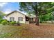 Charming single-story home featuring a cozy front porch and well-maintained landscaping at 2172 Oakland Ridge Dr, Lawrenceville, GA 30044