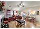 Bright living room with fireplace, hardwood floors, comfortable seating, and abundant natural light at 2172 Oakland Ridge Dr, Lawrenceville, GA 30044