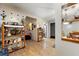 Versatile living space with hardwood floors, built-in shelving, and seamless transition to other areas at 2172 Oakland Ridge Dr, Lawrenceville, GA 30044