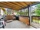 Enclosed patio features a screened-in area and comfortable outdoor seating at 2172 Oakland Ridge Dr, Lawrenceville, GA 30044