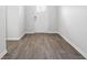 Charming entryway featuring durable wood-look flooring, complemented by neutral walls and trim for a clean, welcoming aesthetic at 342 Overlook Rd, Covington, GA 30014