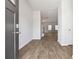 Inviting entryway with wood-look flooring leading into a spacious living area, offering a seamless transition and modern aesthetic at 342 Overlook Rd, Covington, GA 30014