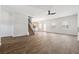 Spacious living room with wood-look floors, stairs to the second floor and access to the kitchen and dining area at 342 Overlook Rd, Covington, GA 30014