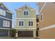 Charming two-story home featuring a two-car garage and two small decks at 735 Ponce De Leon Pl Ne Unit 1, Atlanta, GA 30306