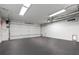 Garage with painted floors and garage door at 735 Ponce De Leon Pl Ne Unit 1, Atlanta, GA 30306