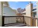 Patio with wood deck overlooking foliage at 735 Ponce De Leon Pl Ne Unit 1, Atlanta, GA 30306