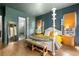 Bedroom with a stylish mirror on the wall at 1126 Mado Loop, Chattahoochee Hills, GA 30268