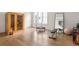 Well-lit exercise room equipped with a sauna, fitness equipment, and a large mirror at 1126 Mado Loop, Chattahoochee Hills, GA 30268