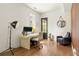 Well-appointed home office with a modern desk setup, ample light, and stylish decor at 1126 Mado Loop, Chattahoochee Hills, GA 30268