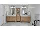 Bathroom featuring double sinks, a tile floor and a storage tower at 335 Wyehwood Ct, Alpharetta, GA 30022