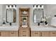 Bathroom featuring double sinks, white marble countertops, and soft wood drawers at 335 Wyehwood Ct, Alpharetta, GA 30022