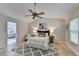 This bedroom has a ceiling fan, decor rug, and an ensuite bathroom at 335 Wyehwood Ct, Alpharetta, GA 30022