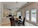 Cozy breakfast nook with backyard access and view into the spacious Gathering room at 335 Wyehwood Ct, Alpharetta, GA 30022