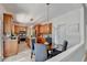 Modern kitchen features stainless steel appliances, central island, and breakfast nook at 335 Wyehwood Ct, Alpharetta, GA 30022
