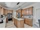 Modern kitchen with center island, stainless appliances, and plenty of cabinet space at 335 Wyehwood Ct, Alpharetta, GA 30022