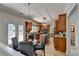 Modern kitchen features stainless steel appliances, central island, and breakfast nook with backyard access at 335 Wyehwood Ct, Alpharetta, GA 30022