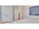 Clean bedroom with carpet features a closet and an open doorway to another room at 505 Altamaha Court, Locust Grove, GA 30248