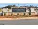Monument sign at River Oaks community entrance is landscaped and features brick pillars and a stacked stone base at 505 Altamaha Court, Locust Grove, GA 30248