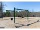 Neighborhood playground with a swing set, benches, and views of a natural wooded area at 505 Altamaha Court, Locust Grove, GA 30248