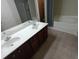 Bathroom with double sink vanity, bathtub, and separate shower at 2162 Oakland Grove Pl, Lawrenceville, GA 30044