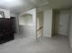 Upstairs hallway with carpet, neutral walls and stairway access to another floor at 2162 Oakland Grove Pl, Lawrenceville, GA 30044