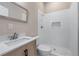 Updated bathroom with white subway tile shower and a modern vanity with a marble countertop and chrome fixtures at 2320 Copper Trail Ln, Buford, GA 30519