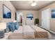 Inviting bedroom with modern decor and a comfortable, well-lit space at 2320 Copper Trail Ln, Buford, GA 30519