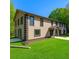 Exterior of a two-story home featuring a manicured lawn and a blue sky backdrop at 2320 Copper Trail Ln, Buford, GA 30519