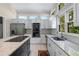 Modern kitchen featuring granite countertops, stainless steel appliances, and custom cabinetry at 2320 Copper Trail Ln, Buford, GA 30519