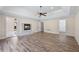 Spacious main bedroom featuring ample natural light, modern flooring, and a decorative fireplace at 2320 Copper Trail Ln, Buford, GA 30519