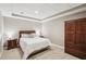 Basement bedroom featuring a large wardrobe, plush carpet, and recessed lights at 553 Augusta Dr, Canton, GA 30115