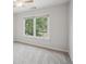 Bright bedroom with a ceiling fan and large window at 553 Augusta Dr, Canton, GA 30115