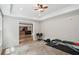 Bright room with carpet and modern ceiling fan, suited as an exercise room at 553 Augusta Dr, Canton, GA 30115