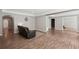 Spacious living room with hardwood floors, neutral walls, and an open floor plan at 553 Augusta Dr, Canton, GA 30115