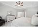 Large main bedroom featuring soft carpet, a ceiling fan and double doors to bath or closet at 553 Augusta Dr, Canton, GA 30115