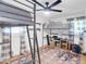 Bedroom with bunk beds and fan with lots of natural light and a colorful rug at 705 Stewart Nw Cir, Marietta, GA 30064