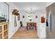 Charming dining room featuring hardwood floors and a view into the recently renovated kitchen at 705 Stewart Nw Cir, Marietta, GA 30064